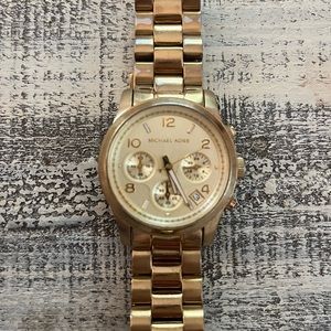 Michael Kors watch. Womens. Gold.
